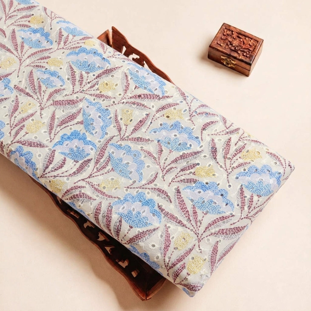 Folded Cream Embroidery Cotton Fabric Highlighting Floral and Texture