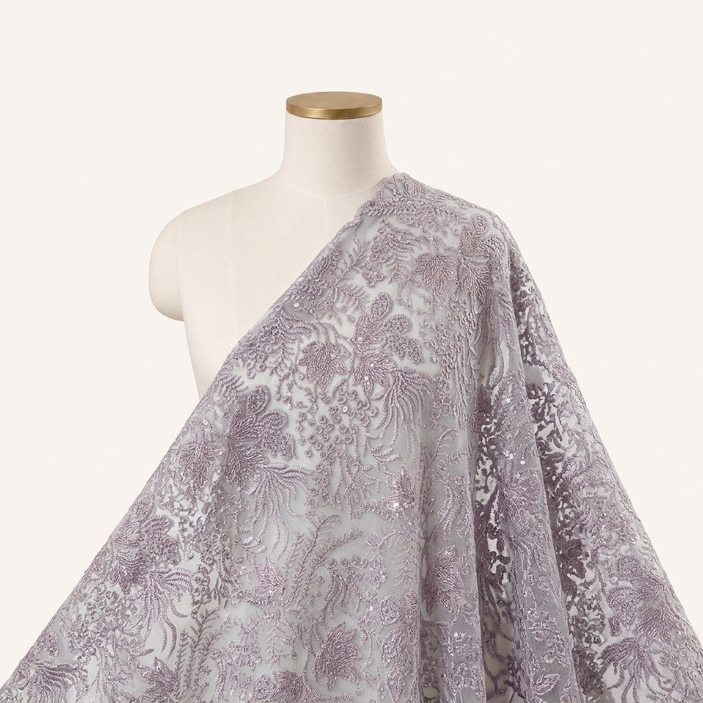 Violet Net Fabric Draped as a saree