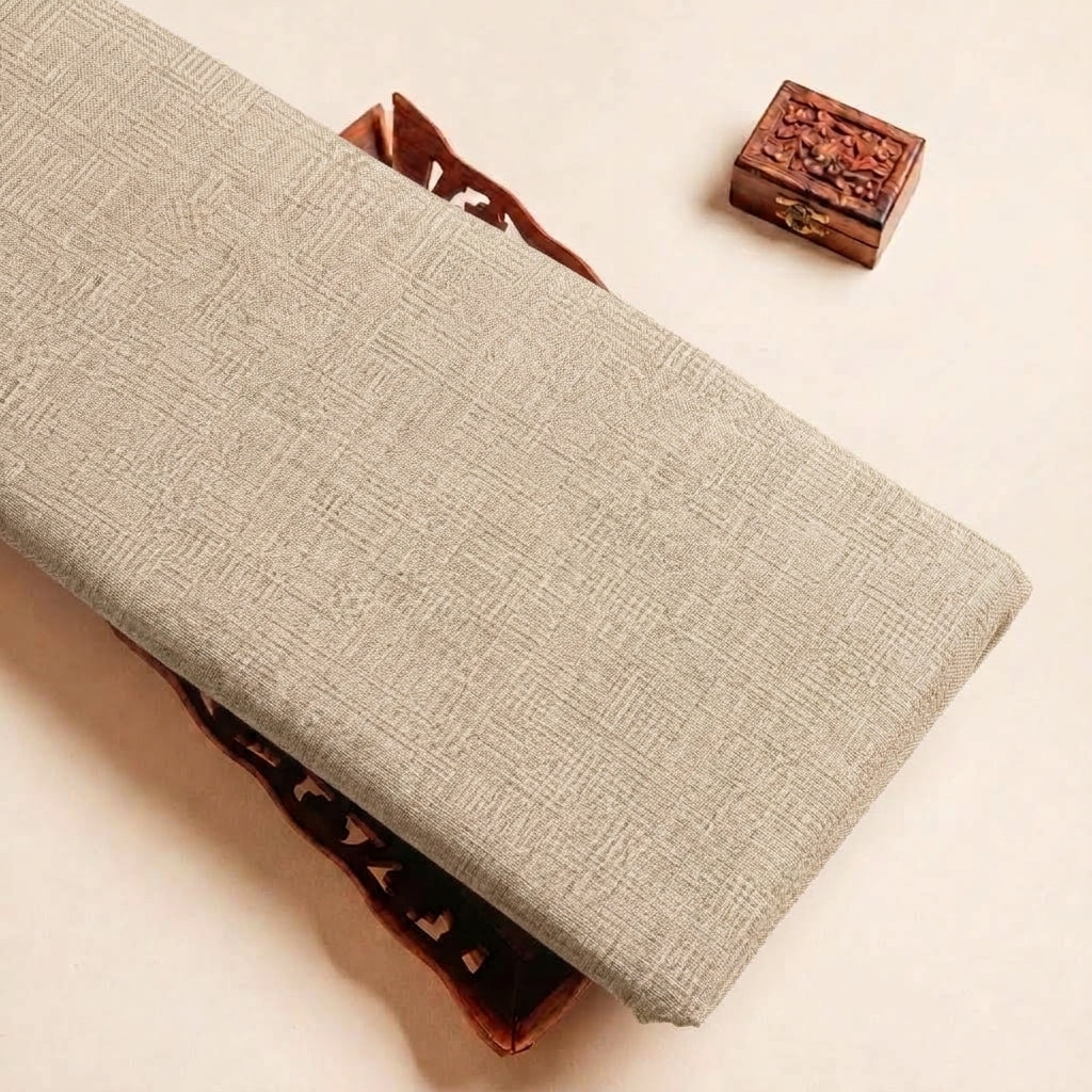 Folded Beige Plain Cambric Cotton Fabric Highlighting and Texture