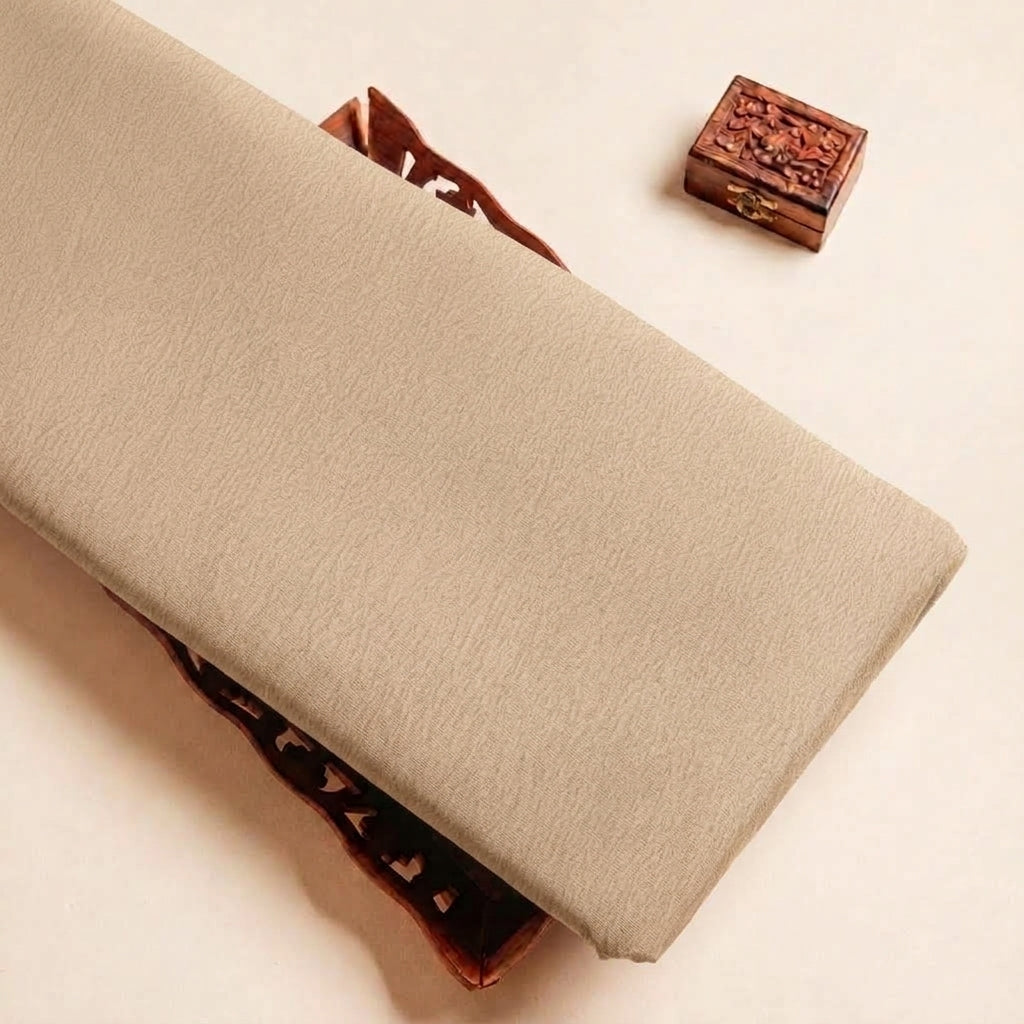 Folded Beige Plain Crepe Fabric Highlighting and Texture