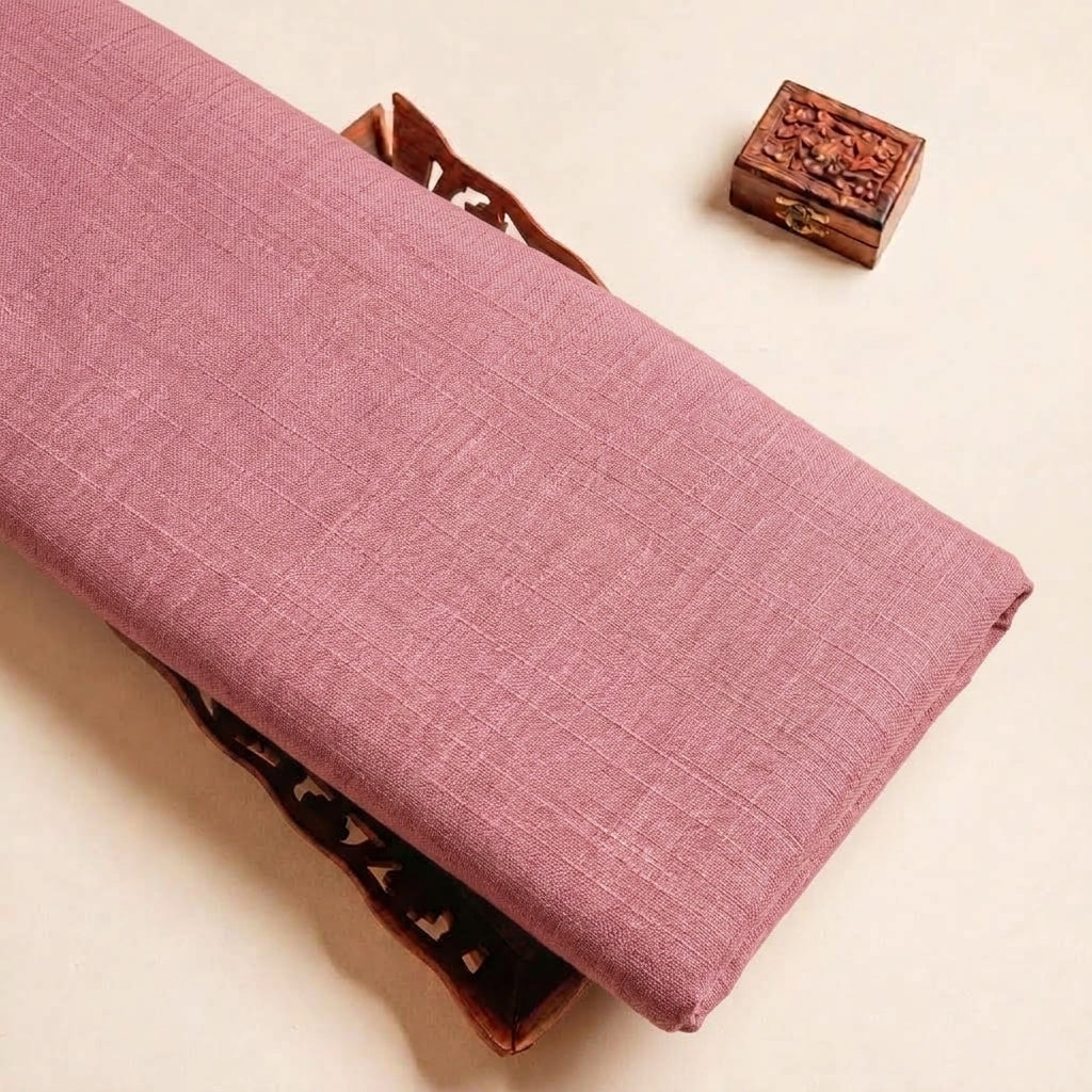 Folded Dusty Pink Plain Cambric Cotton Fabric Highlighting and Texture