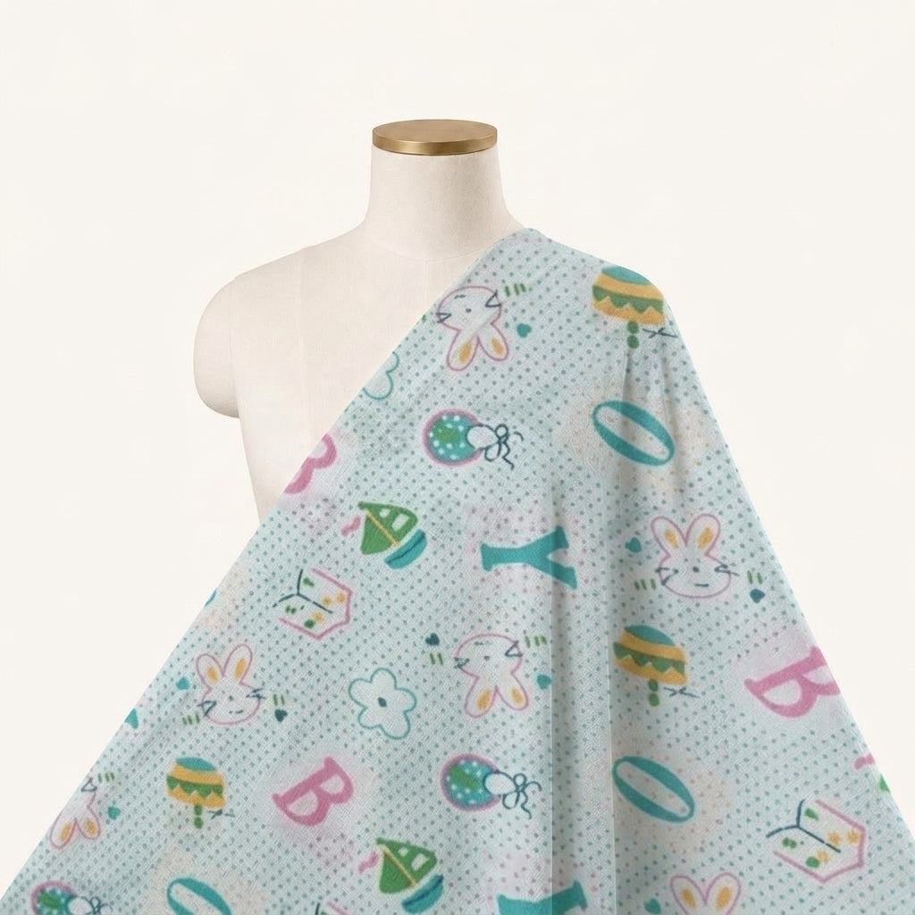 Printed Light Green Printed Cotton Fabric Draped as a saree