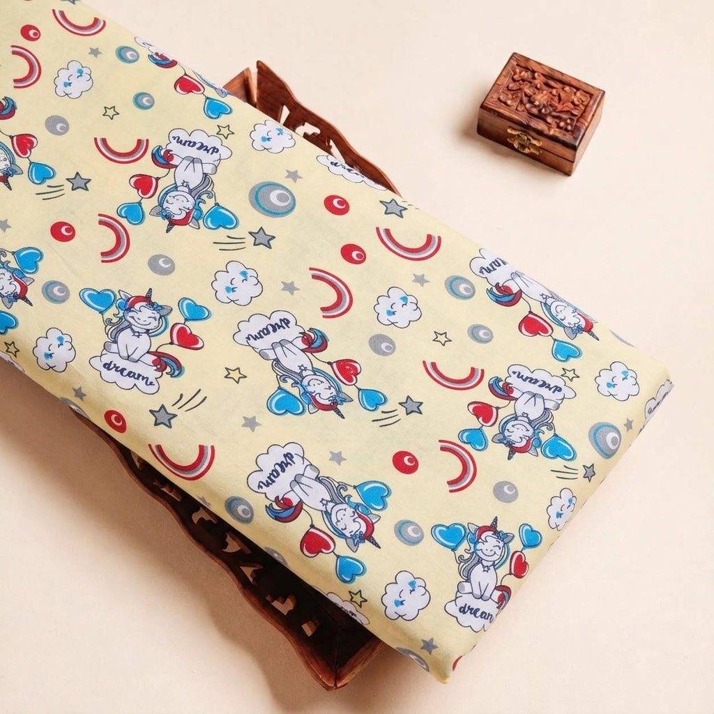 Folded Yellow Printed Cotton Fabric Highlighting Kids and Texture