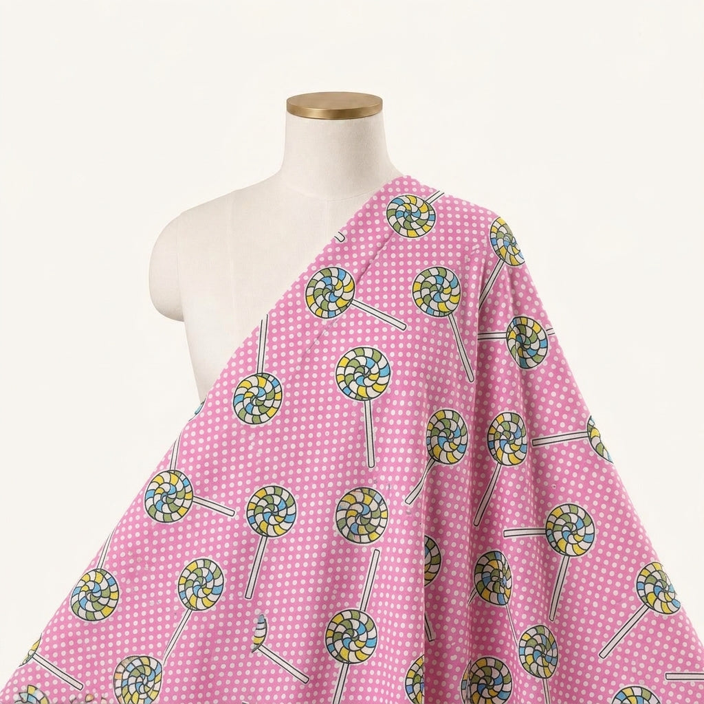 Printed Pink Printed Cotton Fabric Draped as a saree