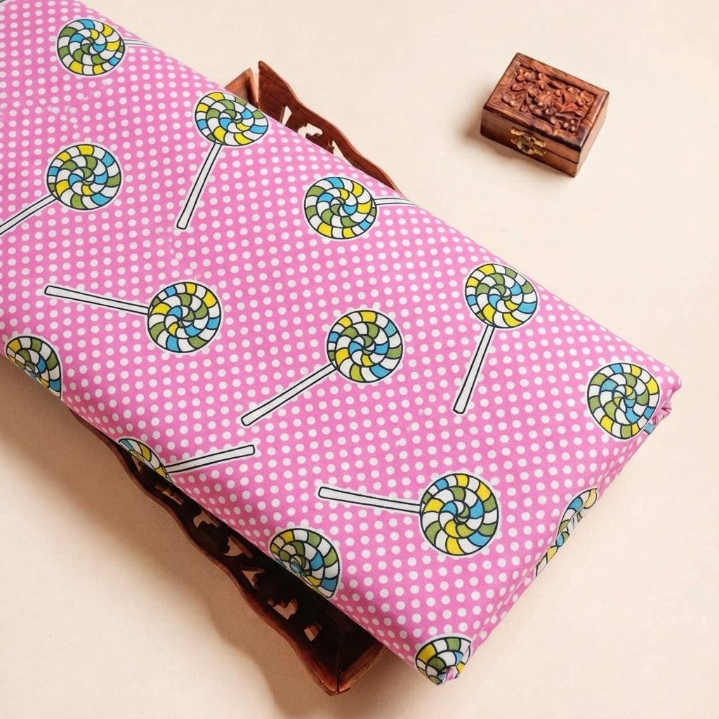 Folded Pink Printed Cotton Fabric Highlighting Kids and Texture