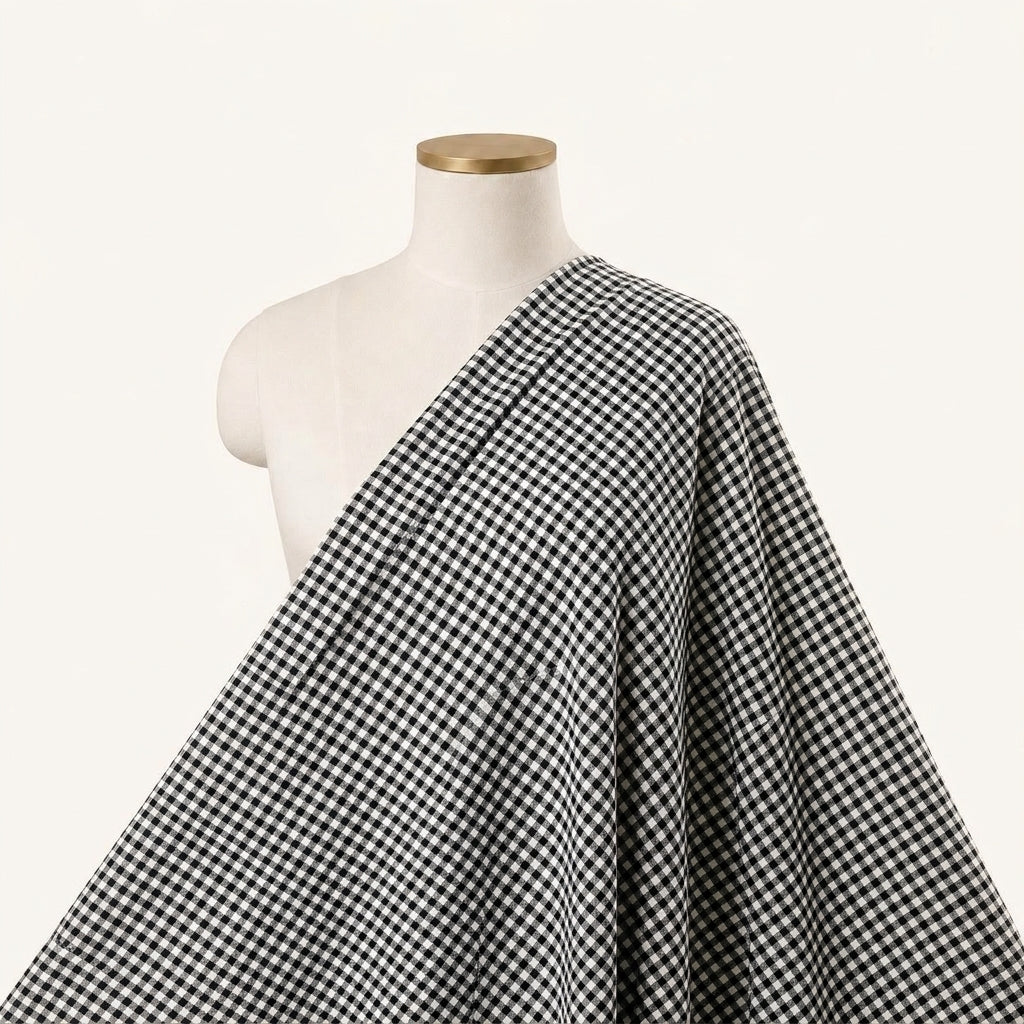 Checked Black Checked Terry Cotton Fabric Draped as a saree