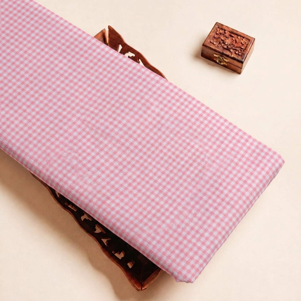 Folded Pink Checked Terry Cotton Fabric Highlighting Cotton and Texture