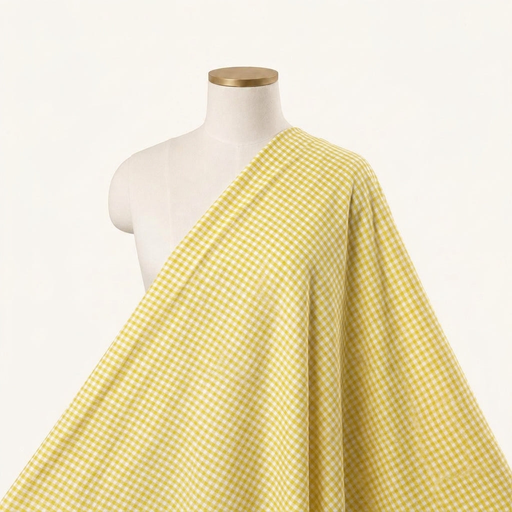 Checked Yellow Checked Terry Cotton Fabric Draped as a saree