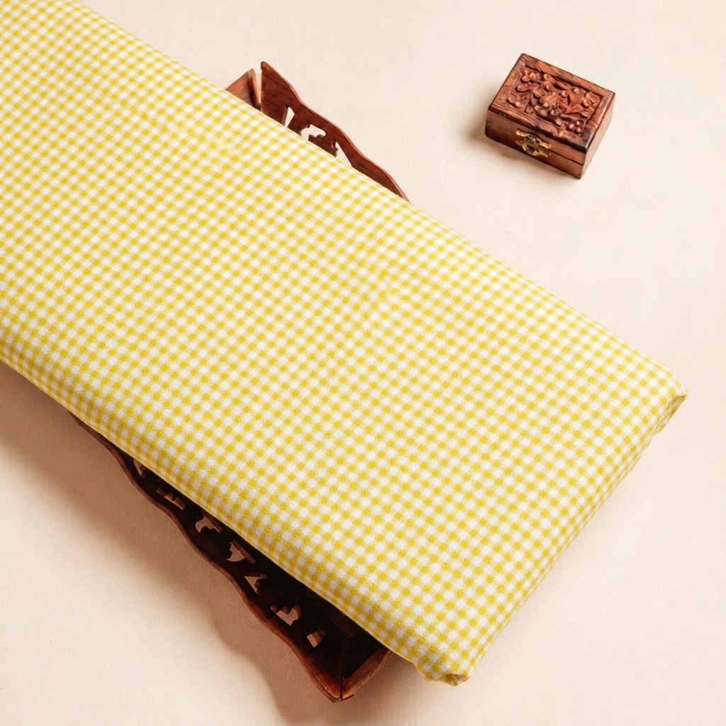 Folded Yellow Checked Terry Cotton Fabric Highlighting Cotton and Texture