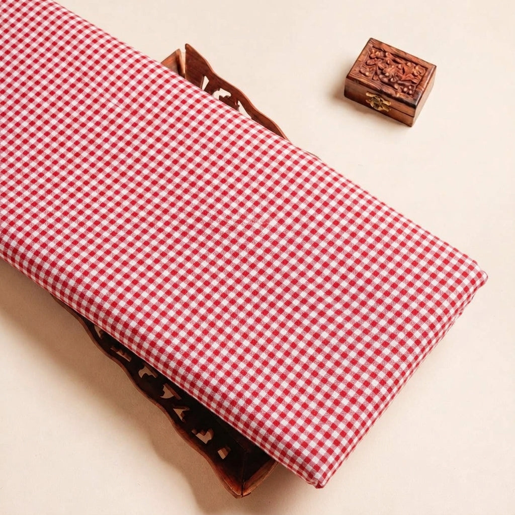 Folded Red Checked Terry Cotton Fabric Highlighting Cotton and Texture