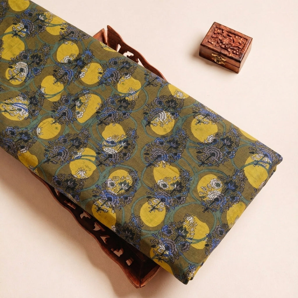 Folded Green Ajrakh Cotton Fabric Highlighting Floral and Texture