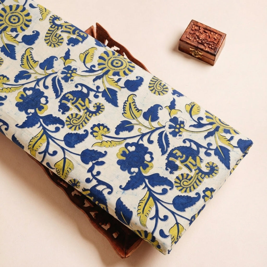 Folded Cream Ajrakh Cotton Fabric Highlighting Floral and Texture