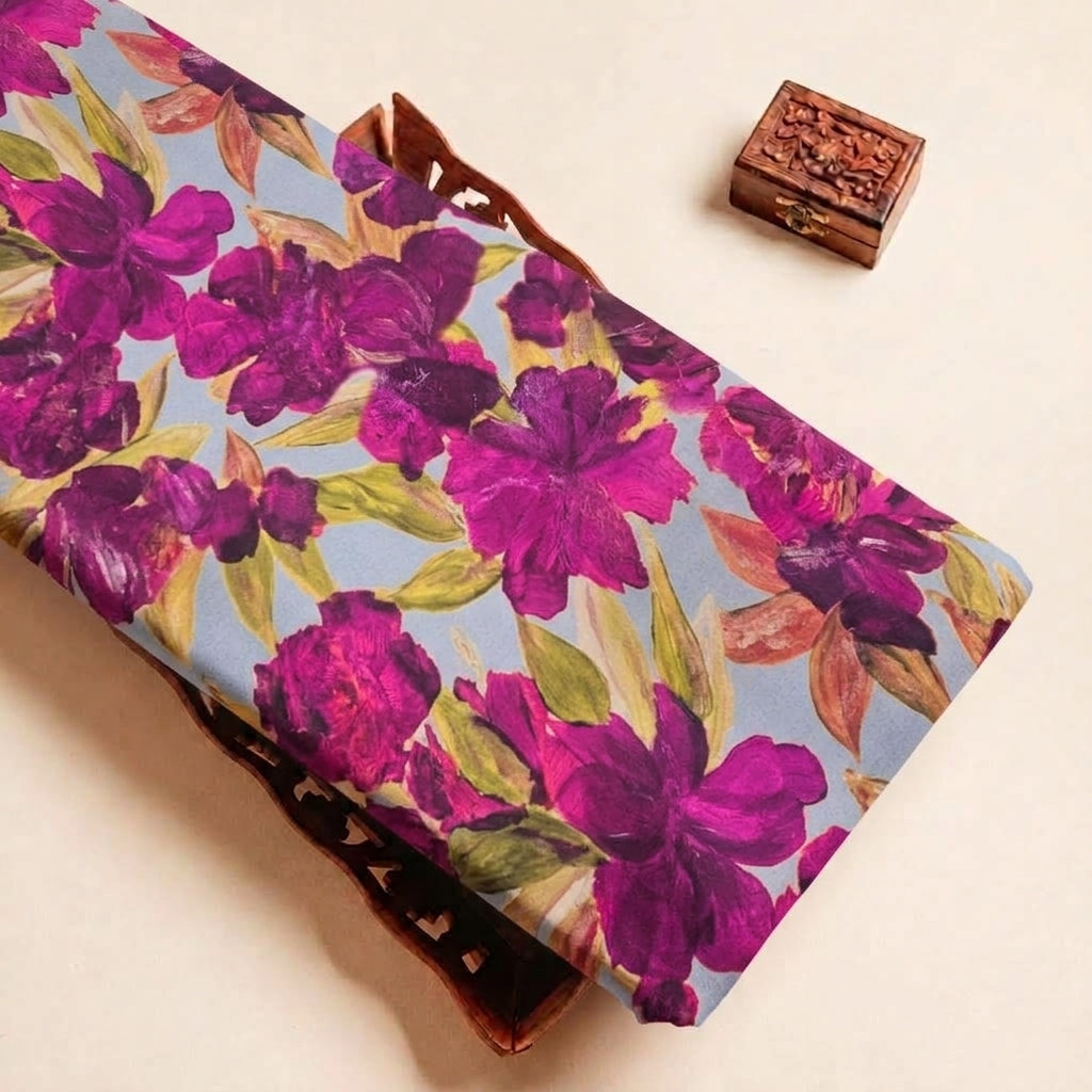Folded Light Blue Floral Satin Fabric Highlighting Texture