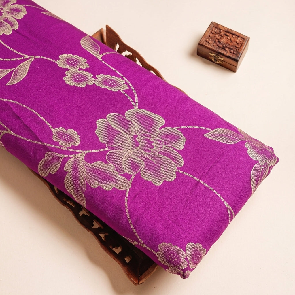 FLORAL PINK FLORAL SATIN GEORGETTE Fabric on a wooden tray