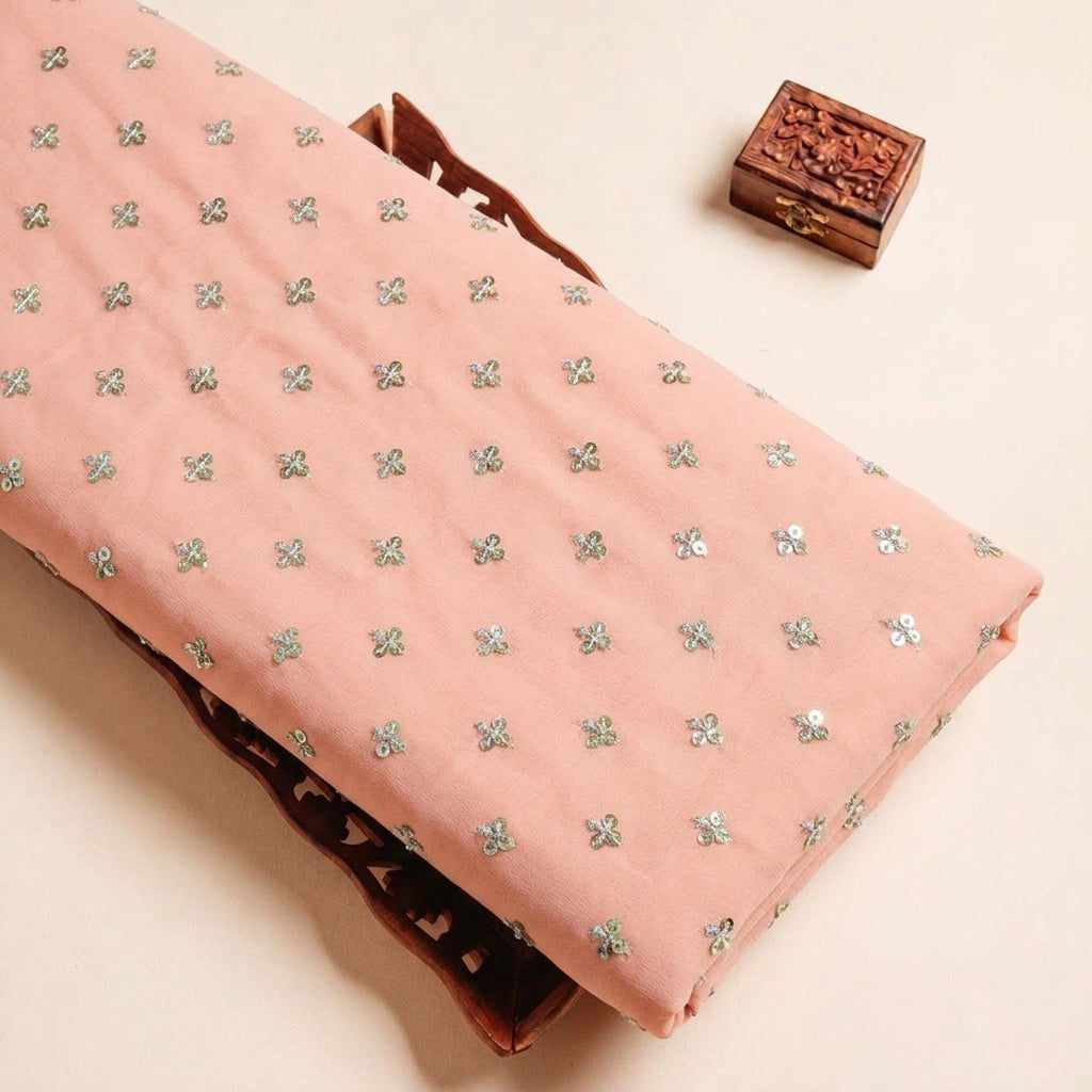 Folded Peach Embroidery Velvet Fabric Highlighting Butta and Texture