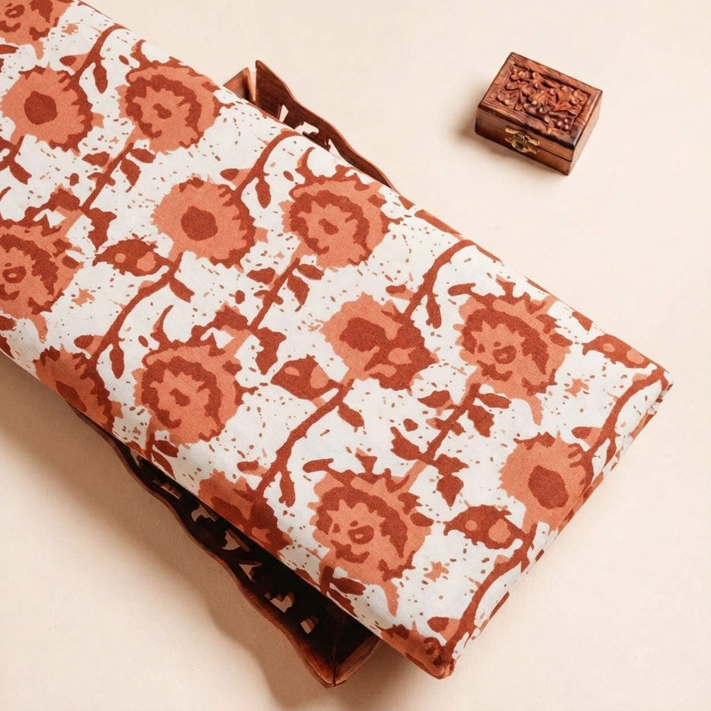 Folded Orange Floral Cotton Fabric Highlighting and Texture