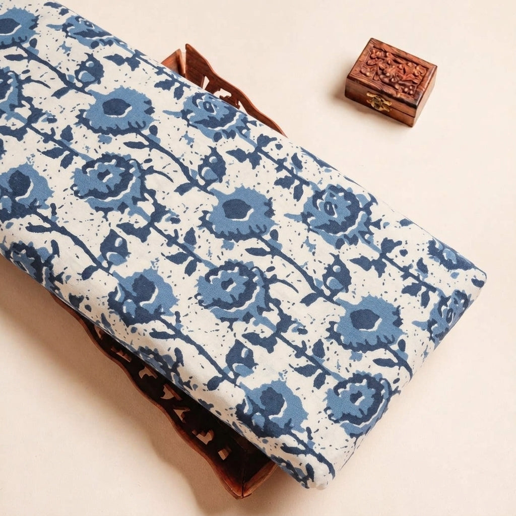 Folded Blue Floral Cotton Fabric Highlighting and Texture