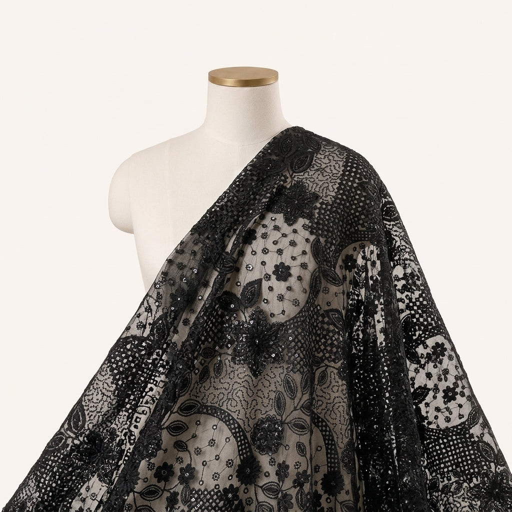 Black Embroidery Net Fabric Draped as a saree