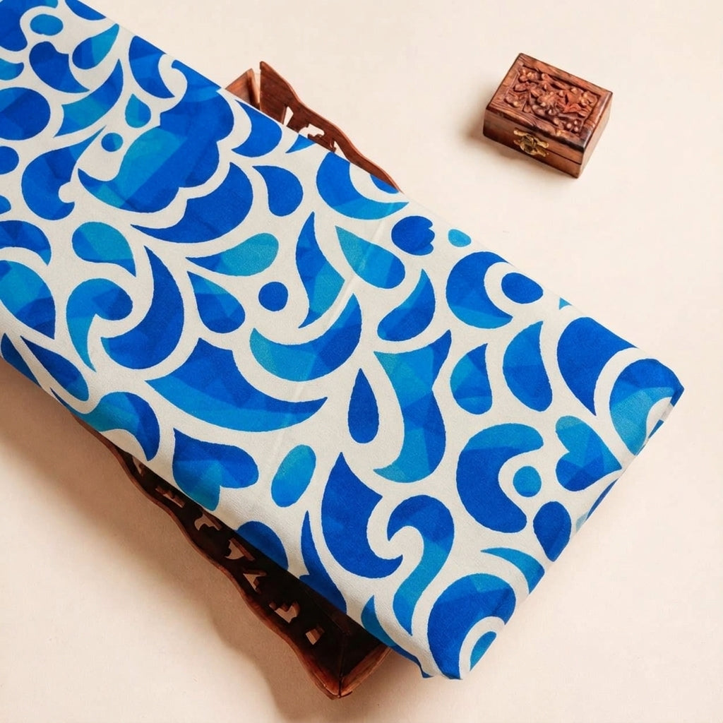 Folded White Paisley Satin Fabric Highlighting and Texture