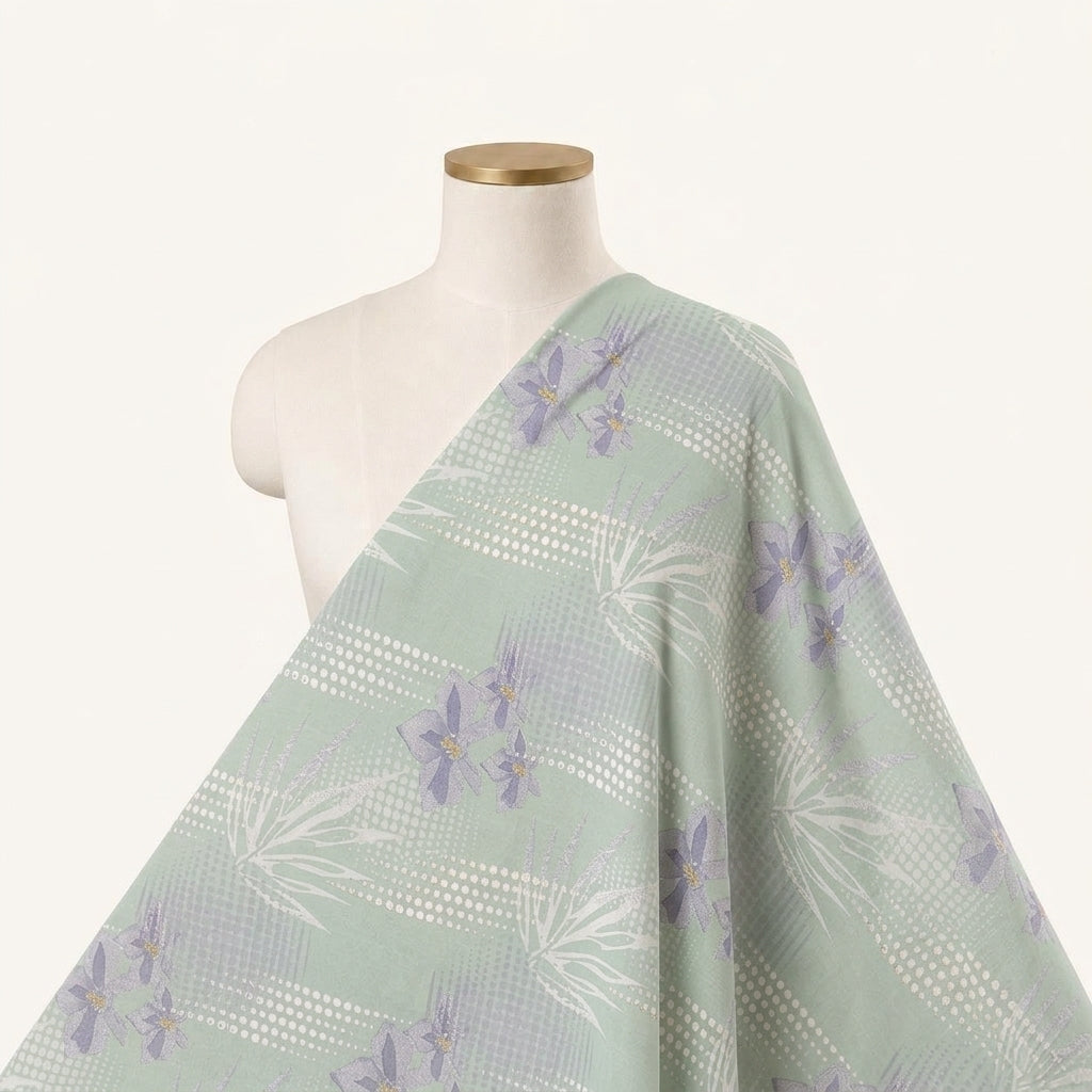 Foil Print Light Green Foil Print Cotton Fabric Draped as a saree