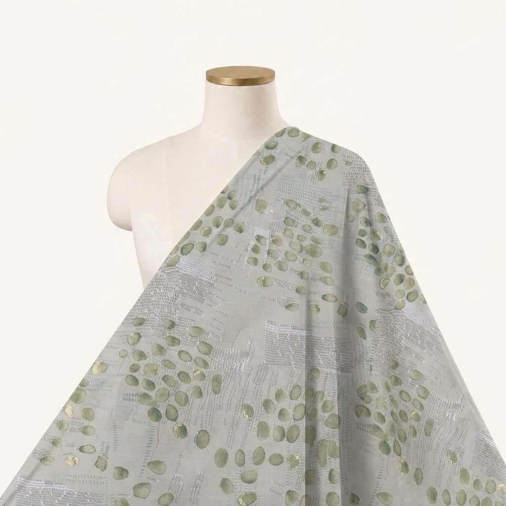 Foil Print Beige Foil Print Cotton Fabric Draped as a saree