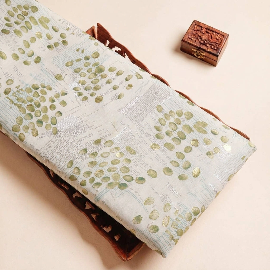 Folded Beige Foil Print Cotton Fabric Highlighting Floral and Texture