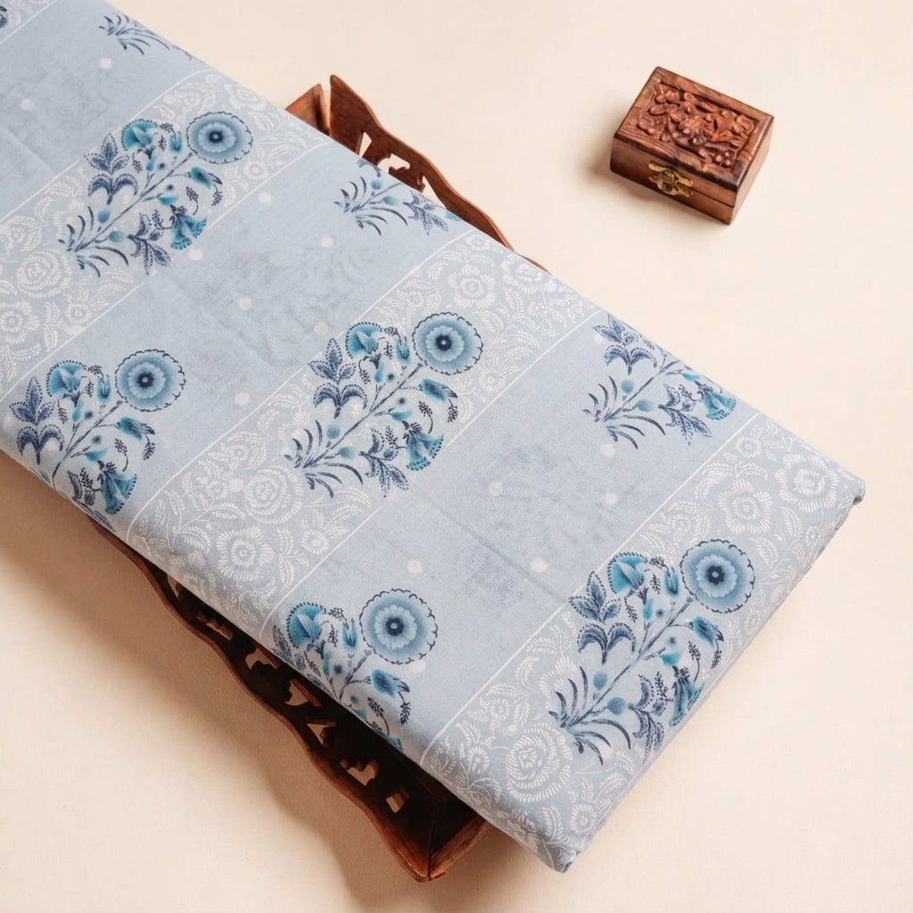 Folded Light Blue Foil Print Cotton Fabric Highlighting Floral and Texture