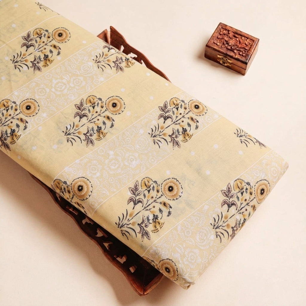 Folded Light Yellow Foil Print Cotton Fabric Highlighting Floral and Texture