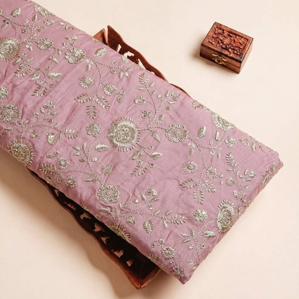 Folded Pink Embroidery Tissue Fabric Highlighting Sequin Thread work and Texture