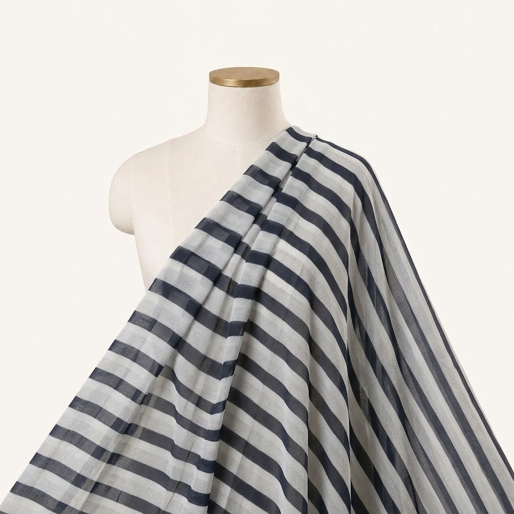 Stripes Off White Stripes Georgette Fabric Draped as a saree