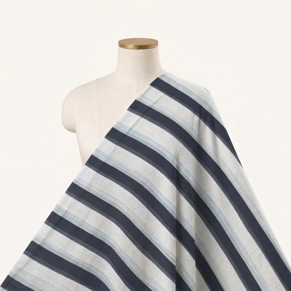 Stripes Off White Stripes Georgette Fabric Draped as a saree