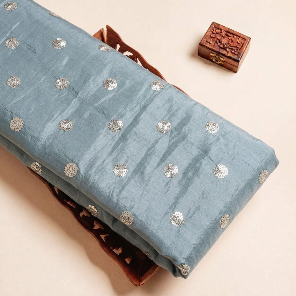 Folded Sky Blue Embroidery Chinnon Fabric Highlighting Butta and Texture