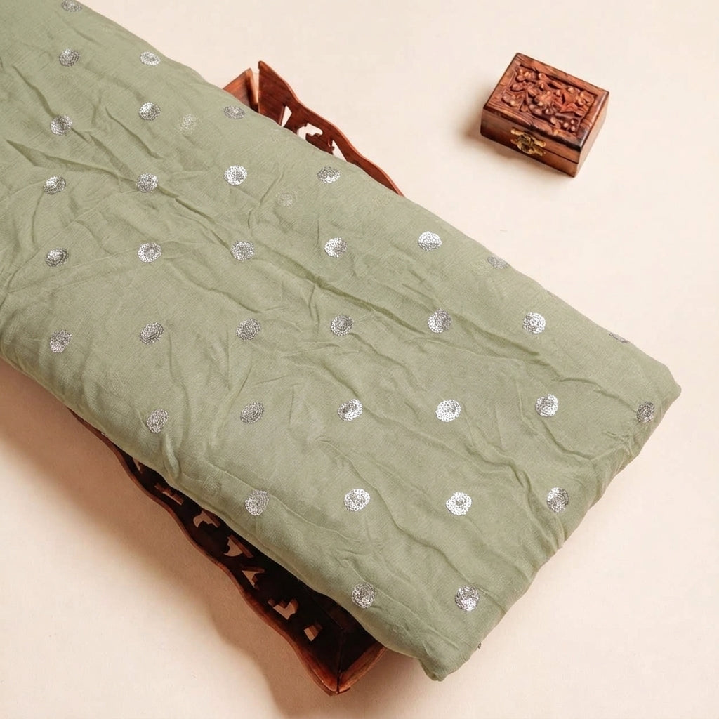 Folded Mint Green Embroidery Chinnon Fabric Highlighting Butta and Texture