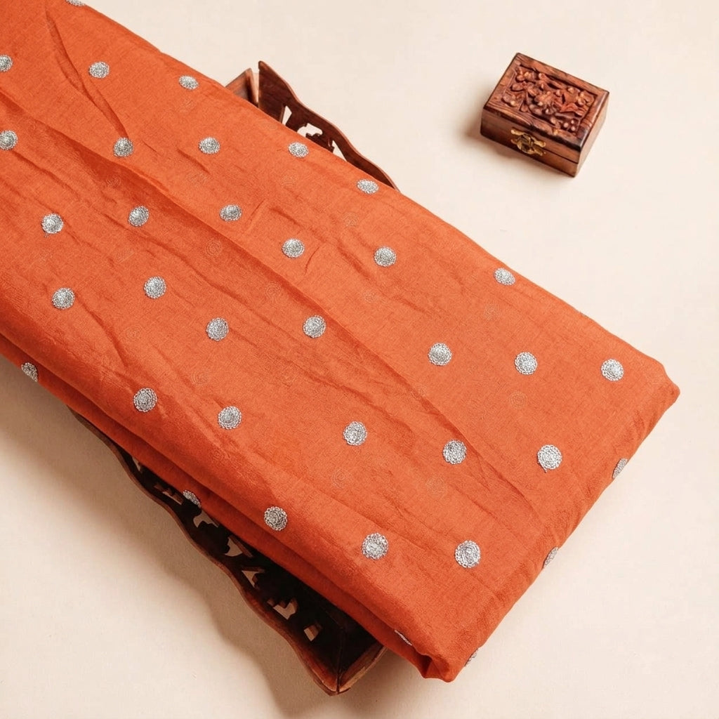 Folded Orange Embroidery Chinnon Fabric Highlighting Butta and Texture