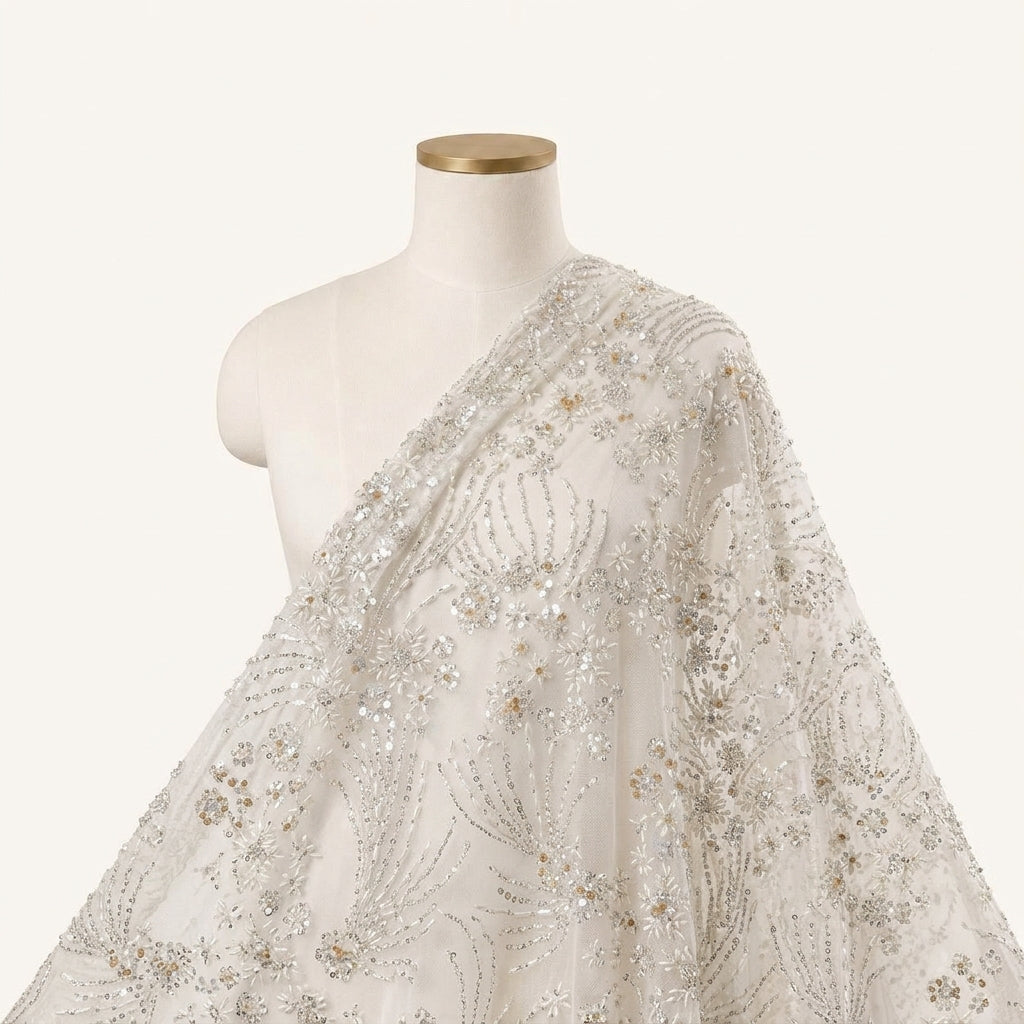 Embroidery White Embroidery Net Fabric Draped as a saree