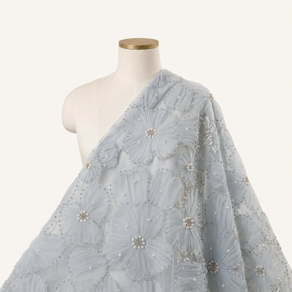 Floral Embroidery Light Blue Floral Embroidery Net Fabric Draped as a saree