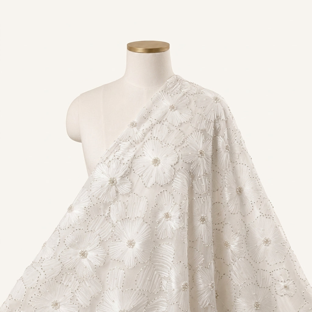 Floral Embroidery White Floral Embroidery Net Fabric Draped as a saree