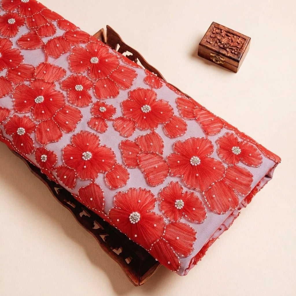 Folded Red Floral Embroidery Net Fabric Highlighting Floral Stone and Texture