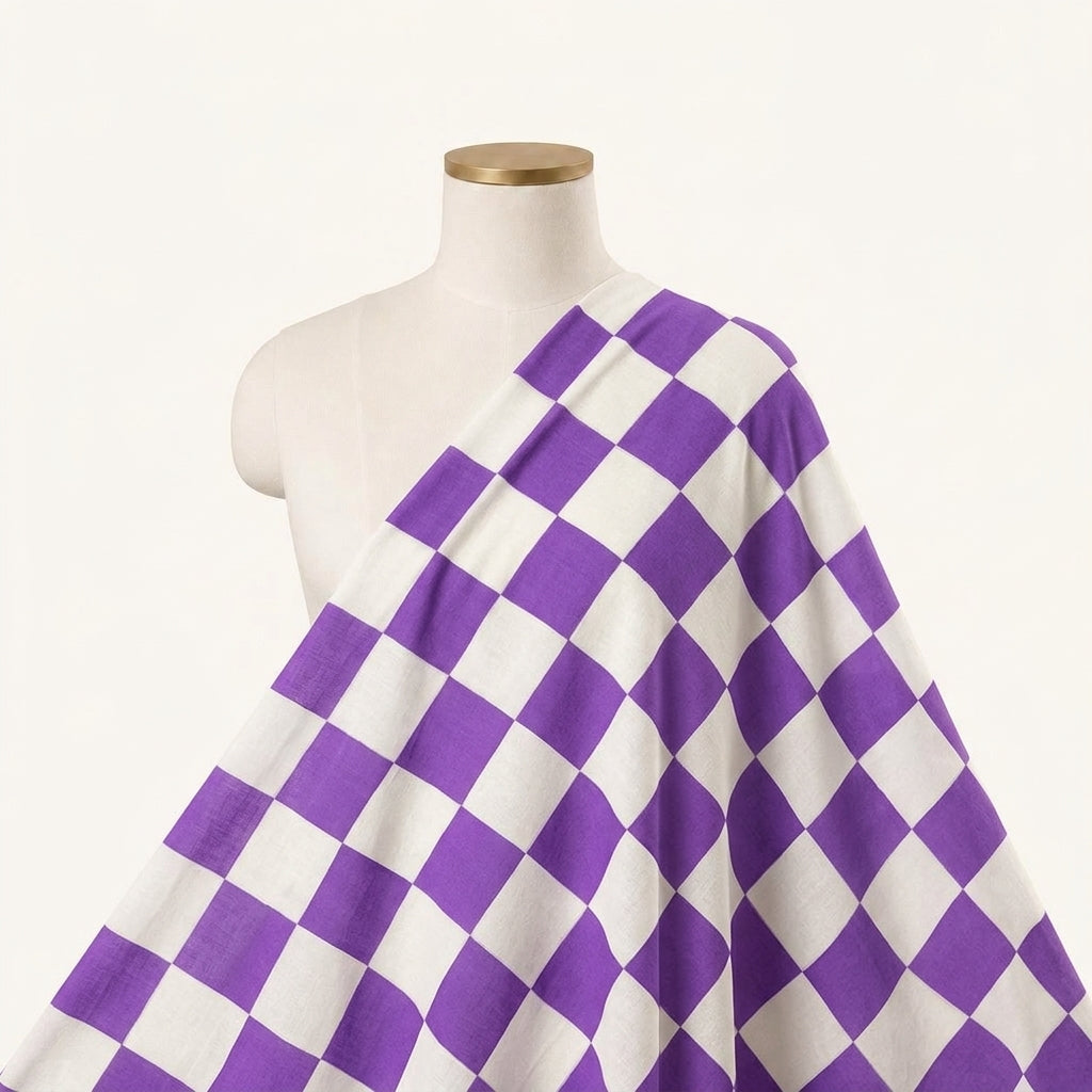 Checked White Checked Cotton Fabric Draped as a saree