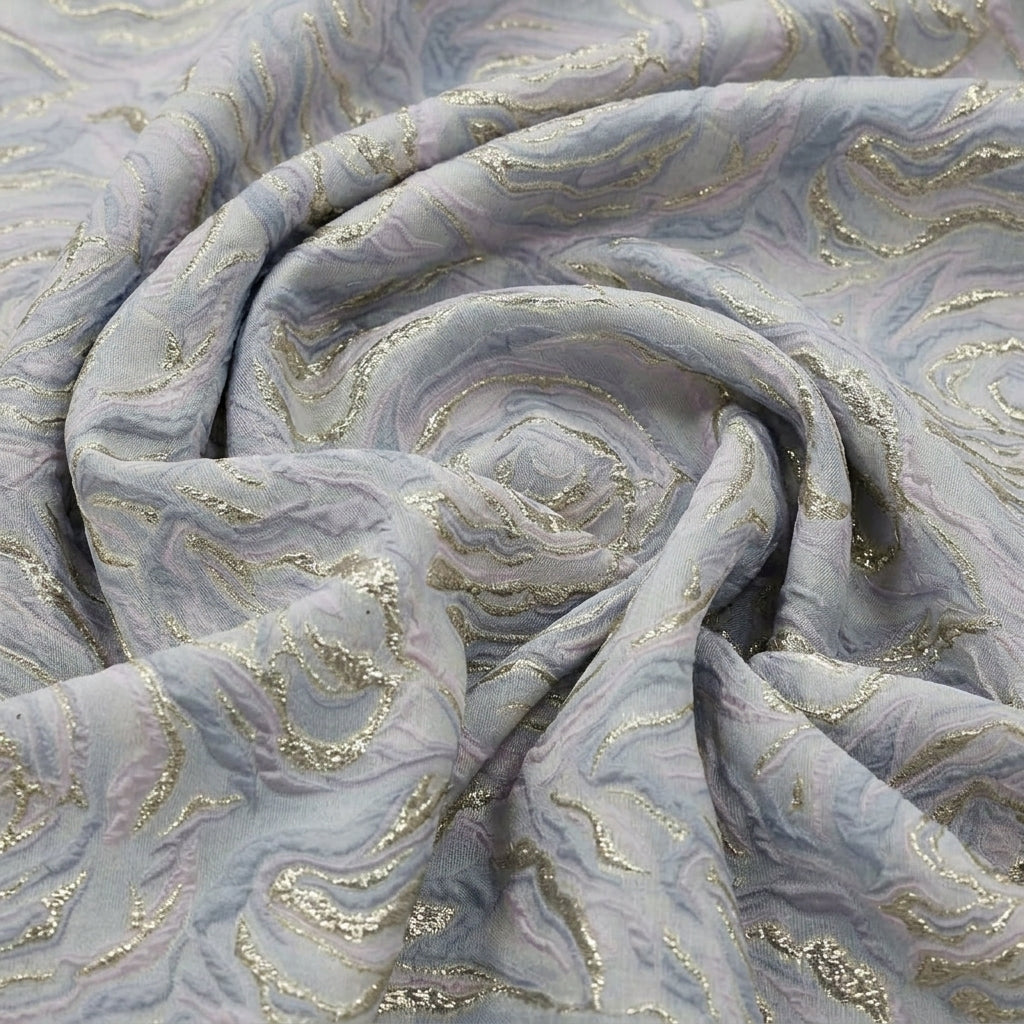 Swirled Pink Embossed Organza Fabric Showing Abstract Foil and Drape