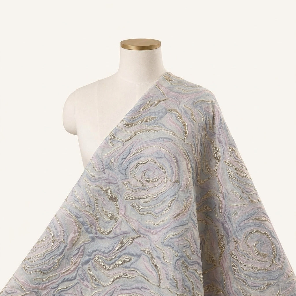 Embossed Pink Embossed Organza Fabric Draped as a saree