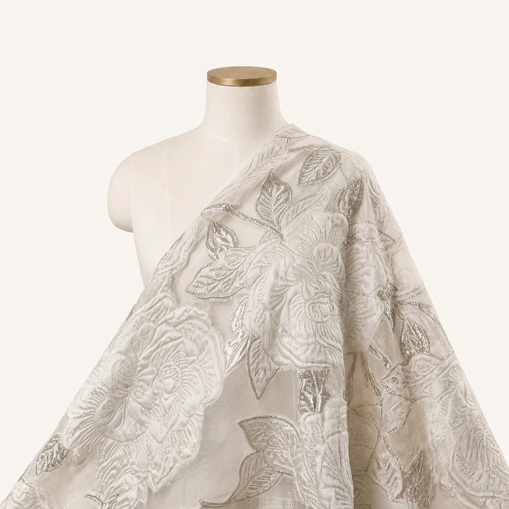 Embossed Cream Embossed Organza Fabric Draped as a saree