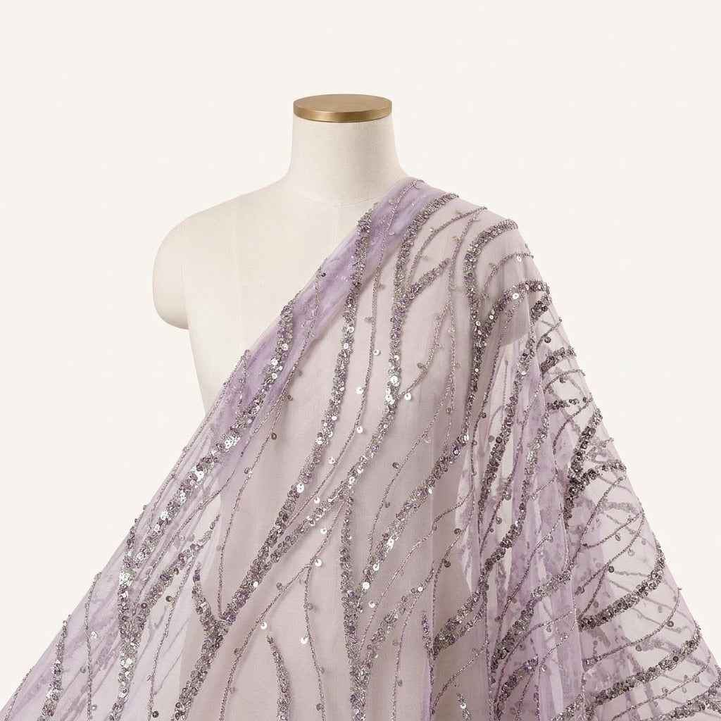 Embroidery Violet Embroidery Net Fabric Draped as a saree