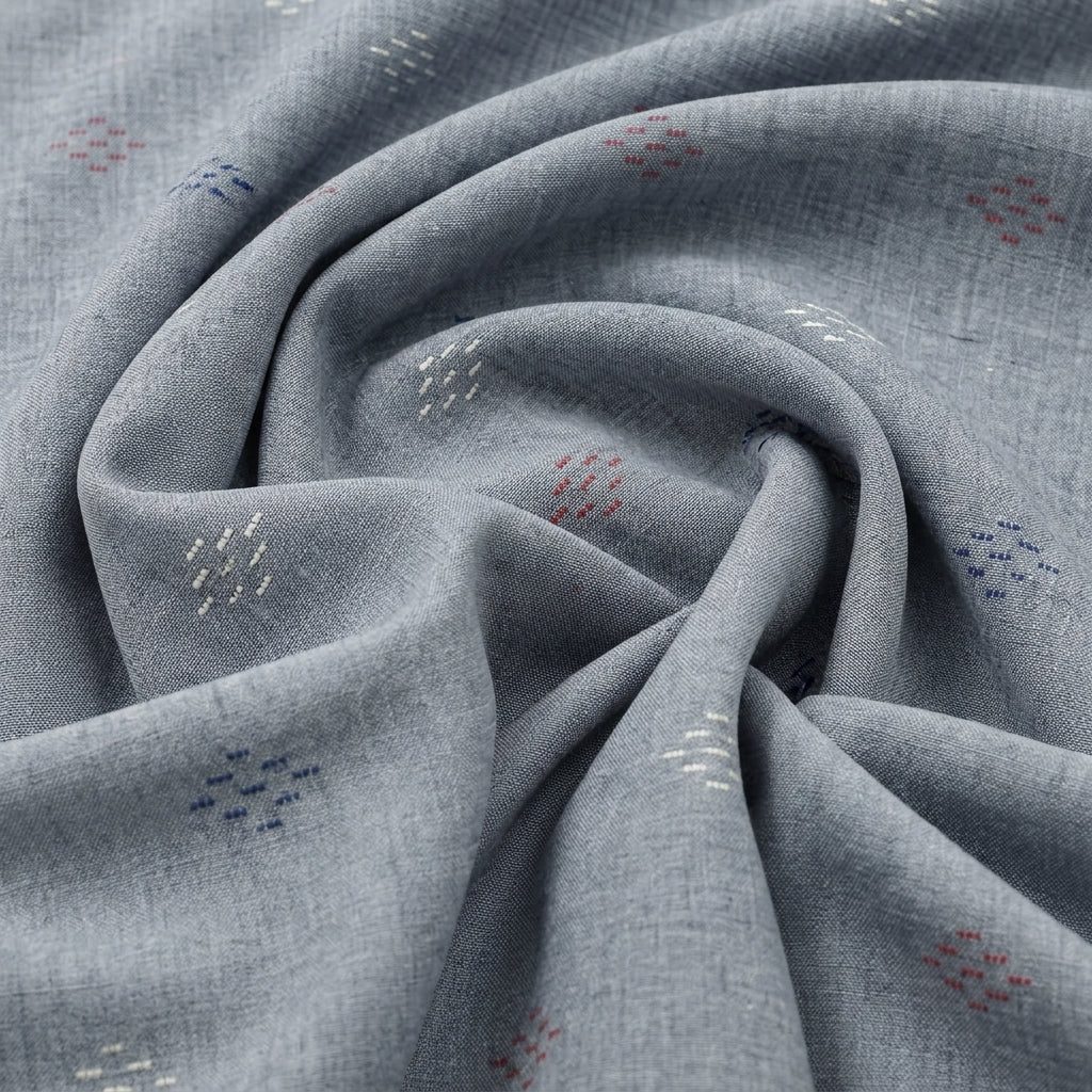 Grey Embroidery Jacquard Fabric, swirled to show the drape