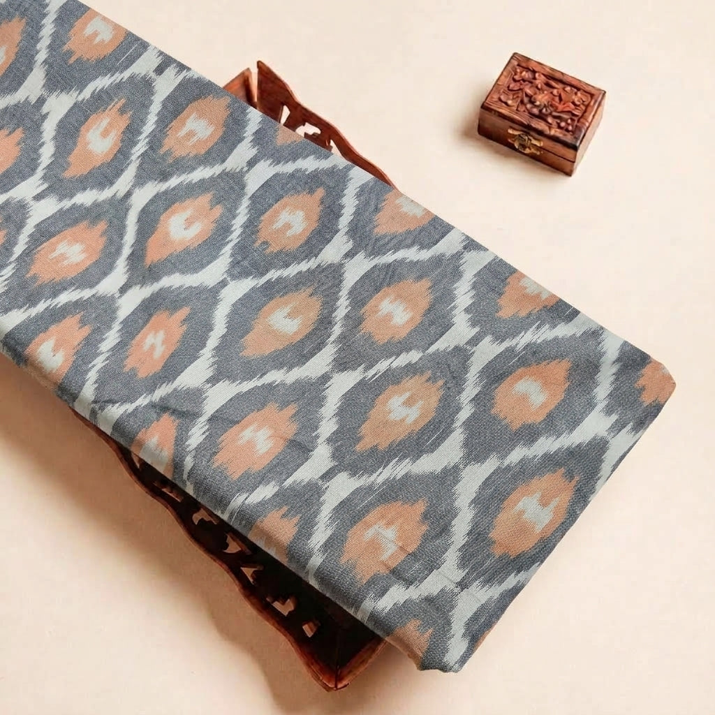 Folded Grey Ikat Cotton Fabric Highlighting Texture
