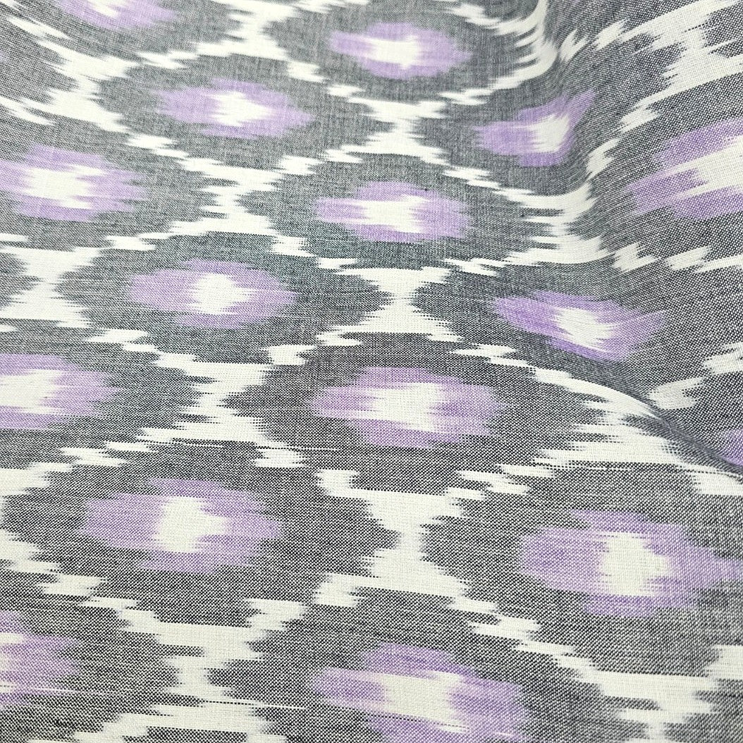 Purple Ikat Cotton Fabric, laid flat