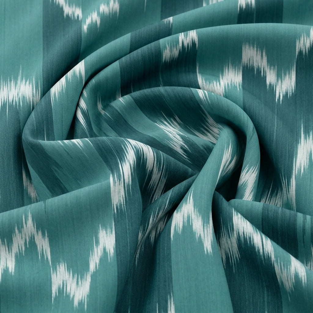Swirled Green Ikat Cotton Fabric Showing Drape