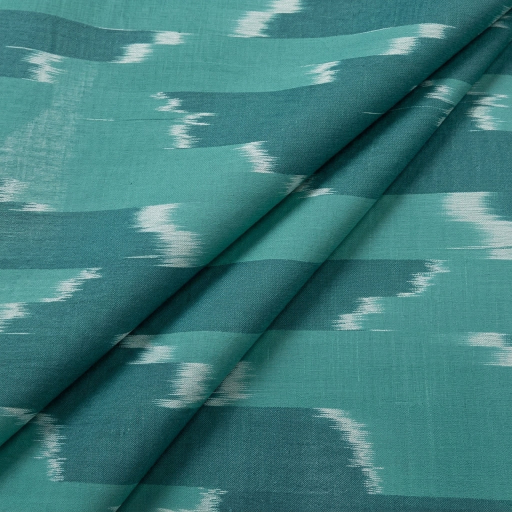 Folded Green Ikat Cotton Fabric