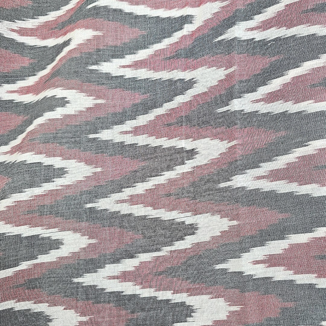 Black Ikat Cotton Fabric, laid flat