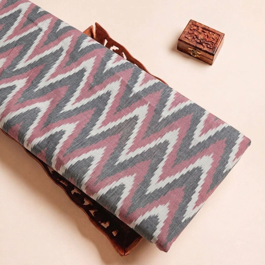 Folded Black Ikat Cotton Fabric Highlighting Texture